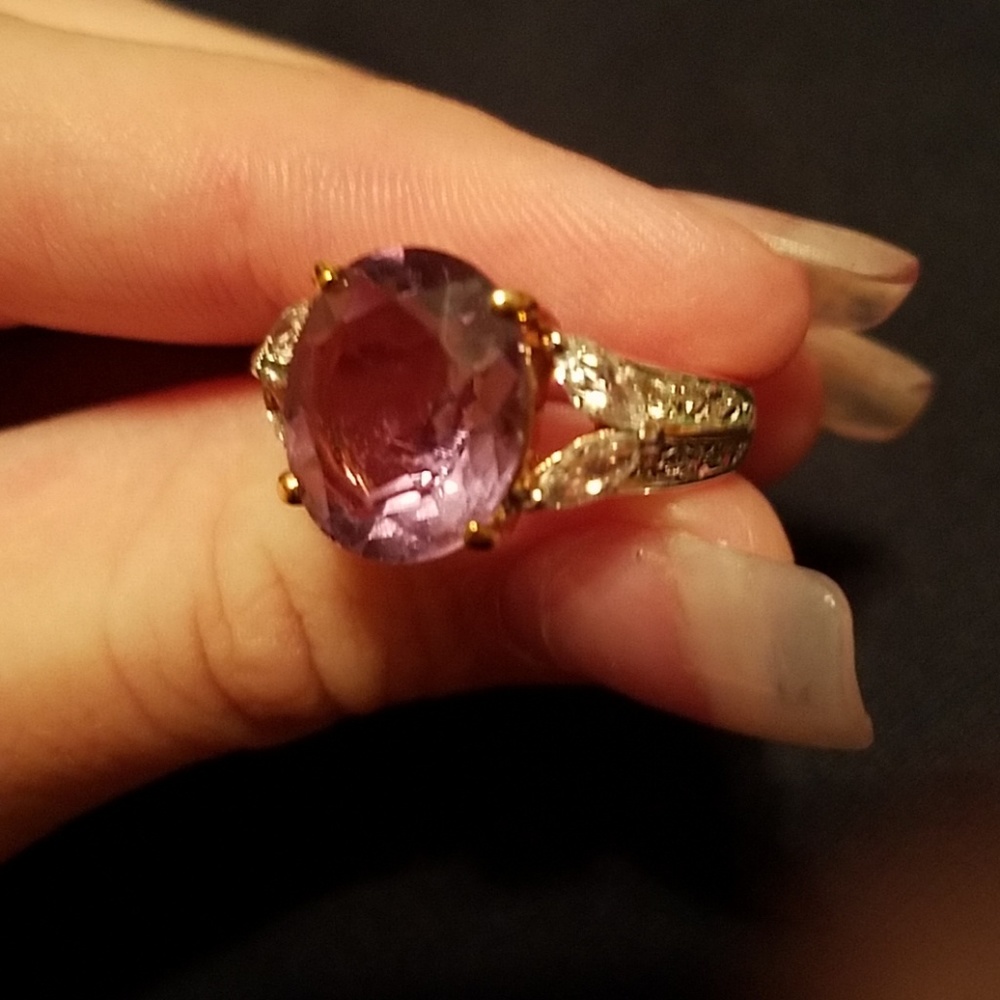Genuine pink stone, fake gold ring